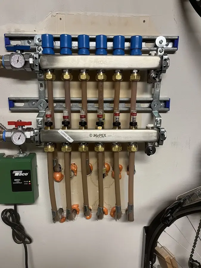 Plumber performing Leak Detection at a residential property in Winnetka